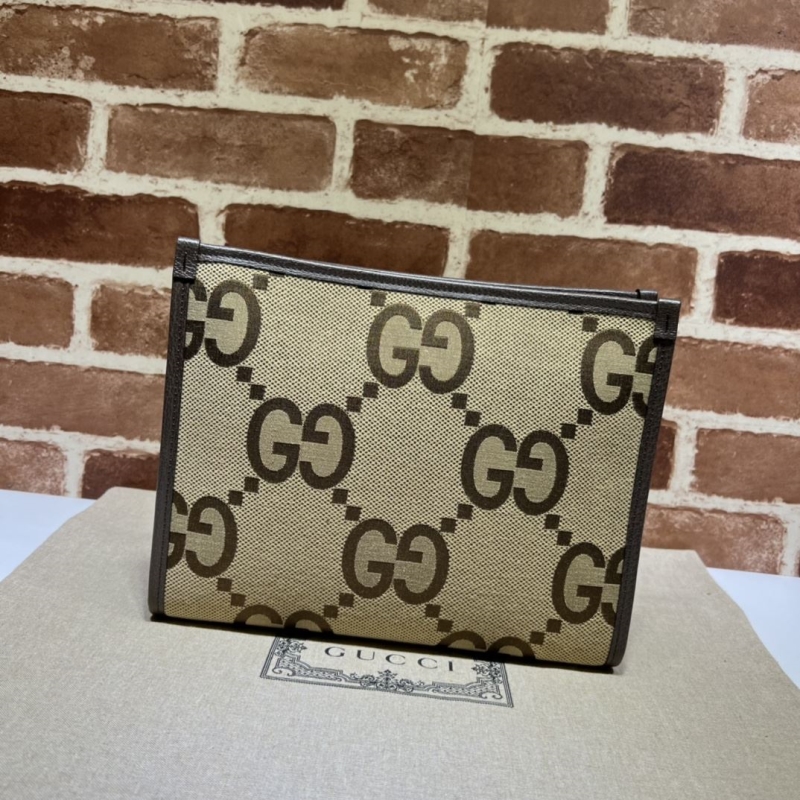 G*u*i clutch bags